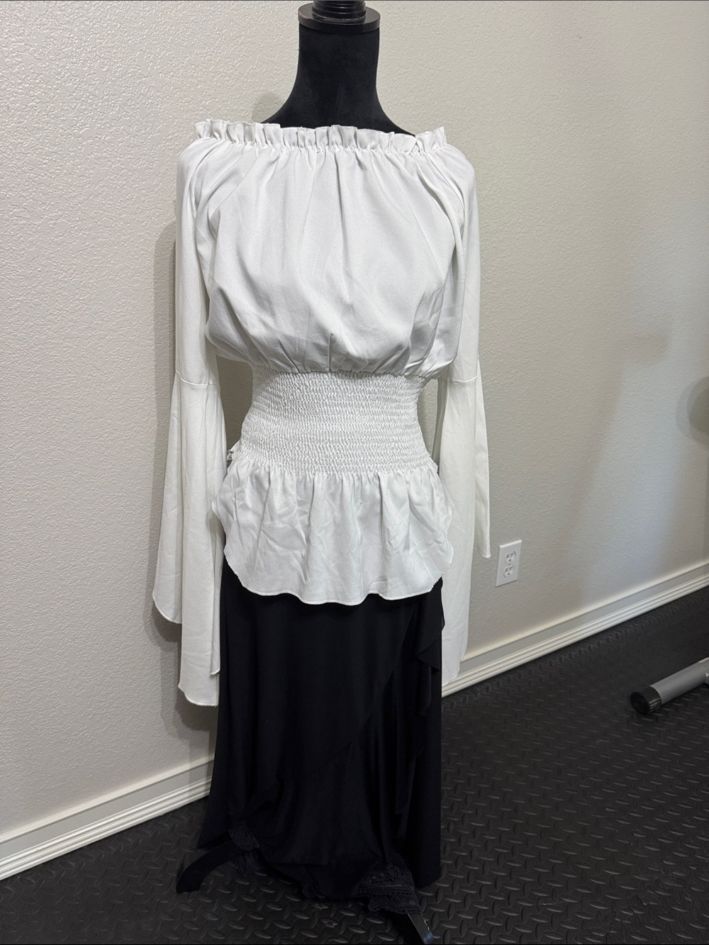 White Off-Shoulder Smocked Peplum Blouse & Flowing Black skirt